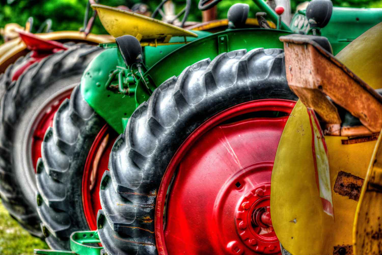 close up of vintage tractor wheels lined up